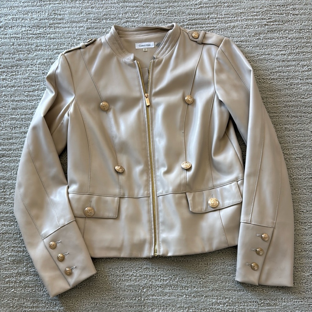 Beige color Calvin Klein faux leather jacket with gold buttons